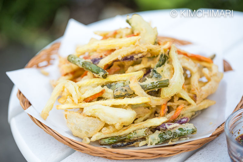 finished vegetable fries piled on paper lined plate