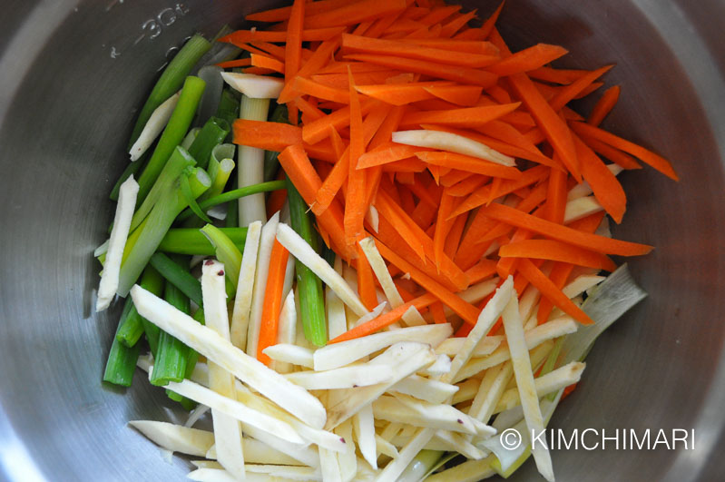 cut veggie matchsticks in mixing bowl