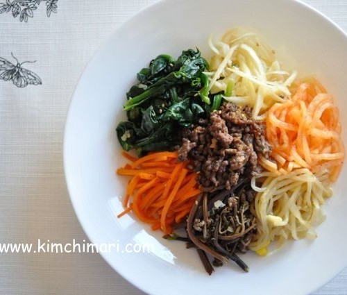 bibimbap plated with wild greens without egg