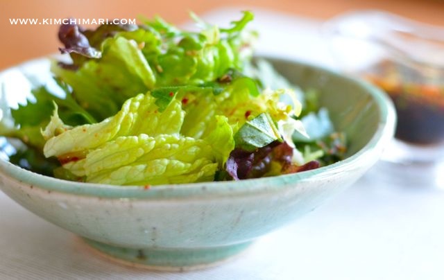 Korean Vegetable Side Dish side view of Korean lettuce salad in green bowl