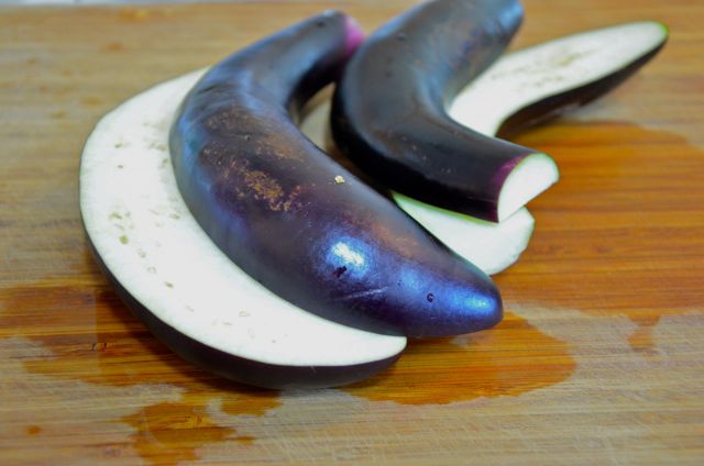 Cutting eggplants in half