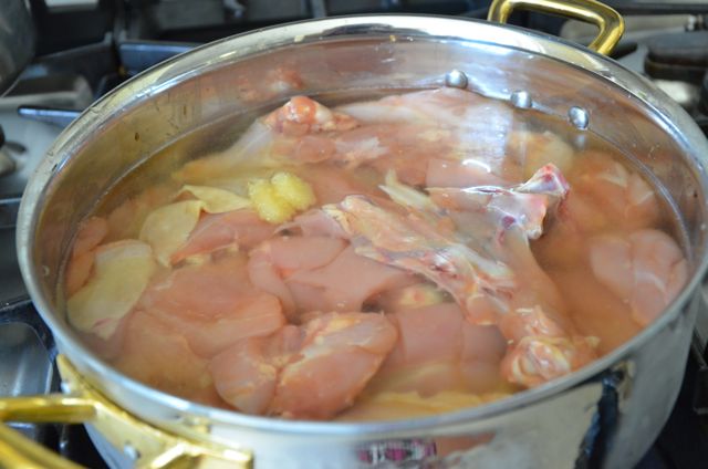 Chicken in pot with water for Dakdoritang