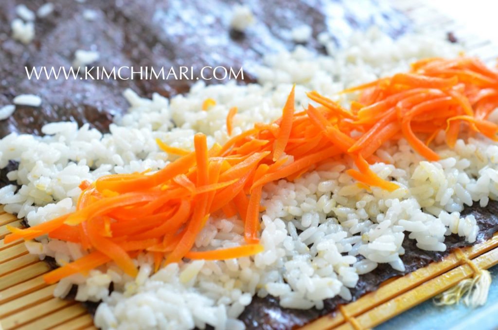 Mini carrot Kimbap - making rice seaweed roll