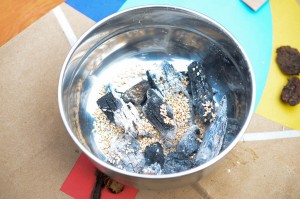 Hot coals with sesame seeds for sterilizing gochujang hangari