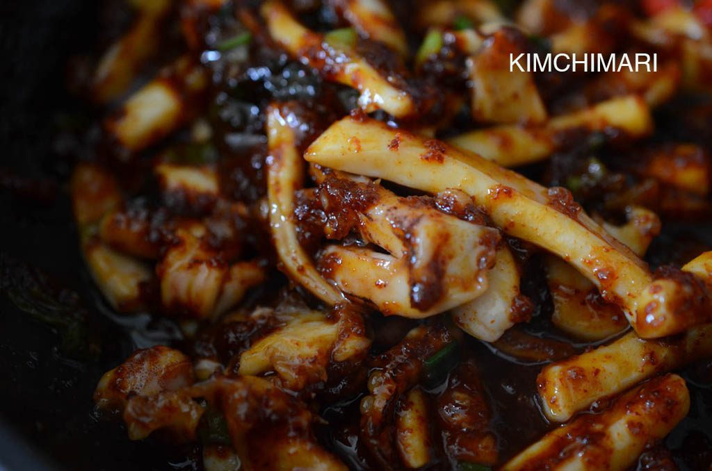 Korean spicy squid stir fry in pan (ojingeo bokkeum)