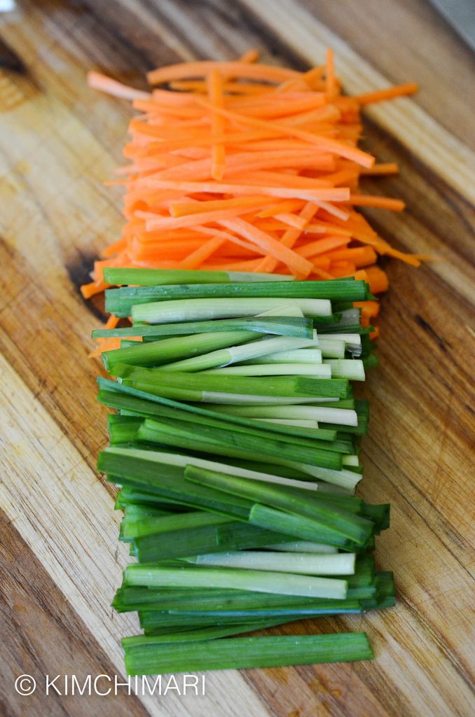 Chives and carrot julienned for chive carrot salad
