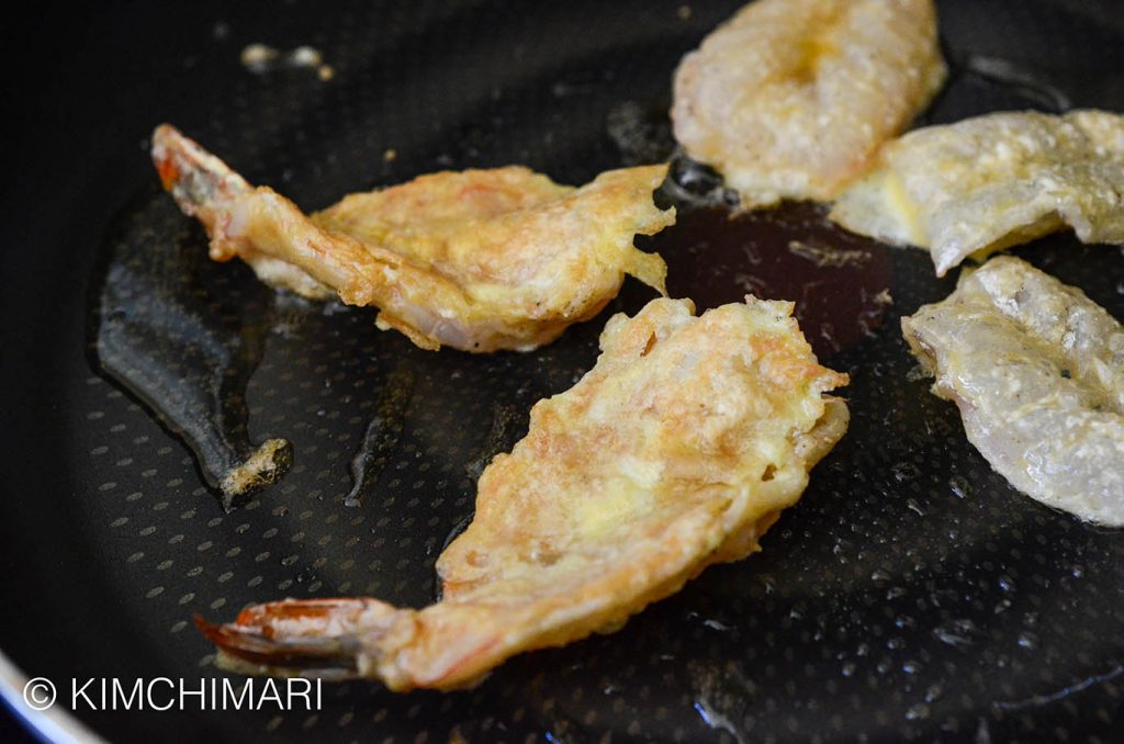 shrimp jeon frying in pan