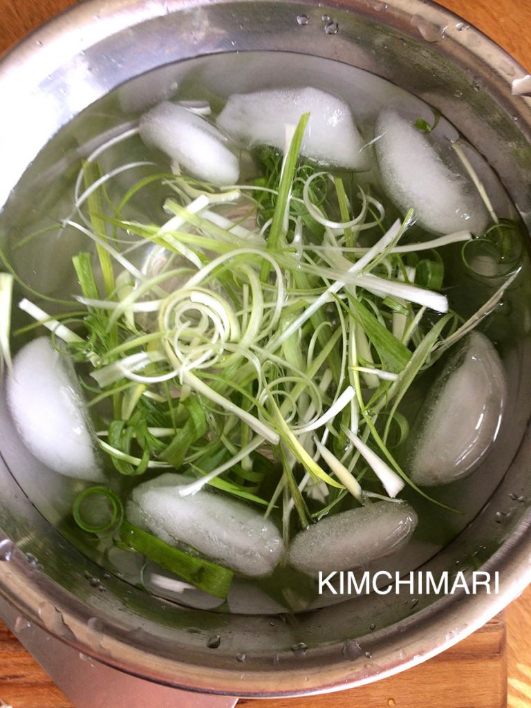 Green Onion slivers in ice water
