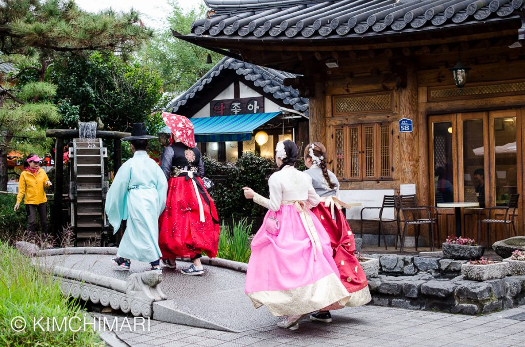 Hanbok dressed young ones walking around in Hanok Village, Jeonju