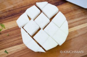 Cutting Radish into cubes for Kkakdugi