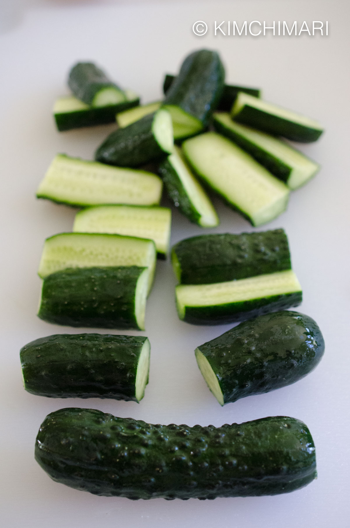 showing stages of cutting cucumbers