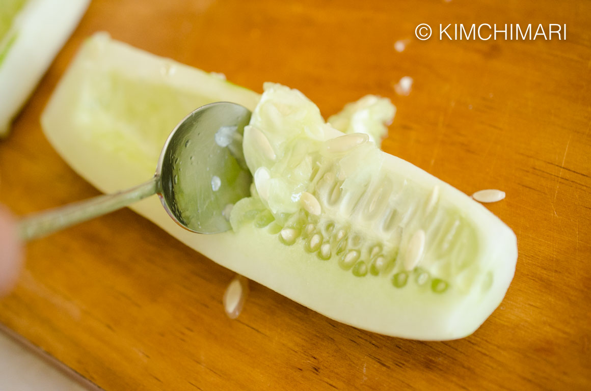 Scraping seed from overgrown cucumber (nogak 노각)