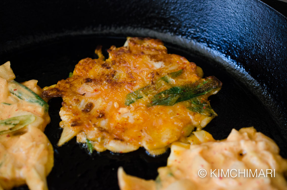 Kimchi Pancake Jeon frying in oil