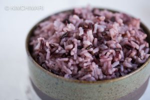 Purple Rice close up in green ceramic rice bowl