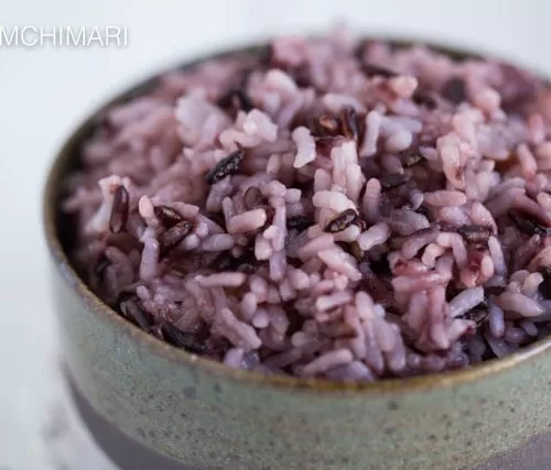 Purple Rice close up in green ceramic rice bowl