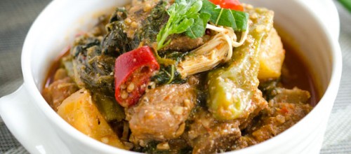 Close up of gamjatang in white bowl individual size