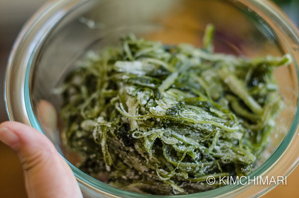 glass bowl with salted seaweed stems