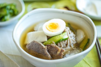 finish mul naengmyeon in a bowl with all toppings