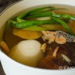 anchovy broth with all vegetables simmering in pot