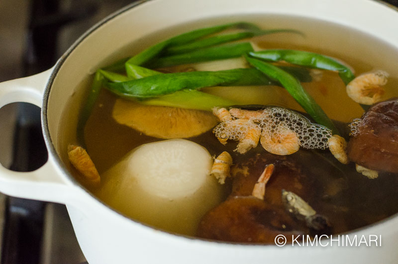 broth with all vegetables simmering in pot