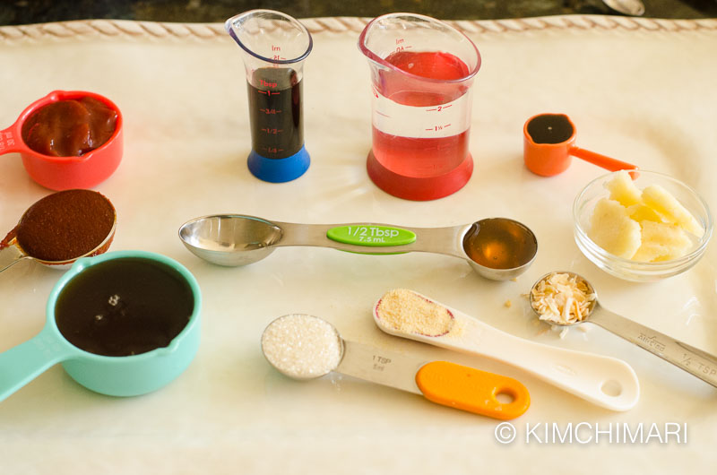 Sauce ingredients measured and laid out on tray