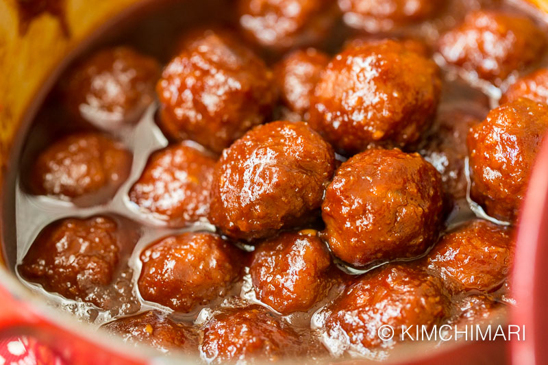 Gochujang meatballs appetizer finished in pot with sauce