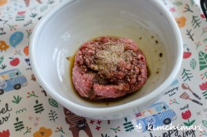 seasoned ground beef in white bowl