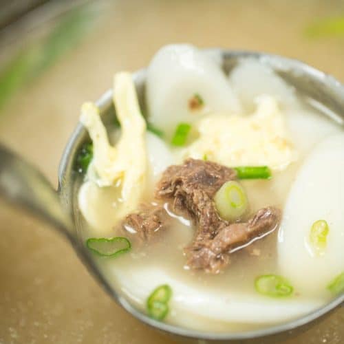 rice cake soup ladled inside Instant Pot