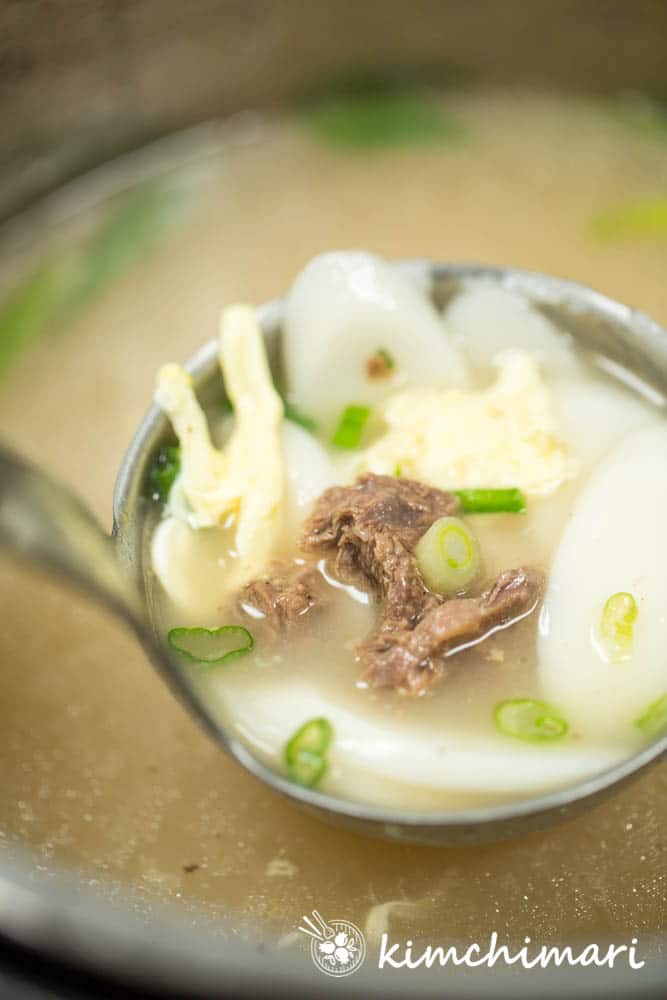 rice cake soup ladled inside Instant Pot