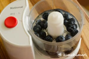 blueberries and water in blender