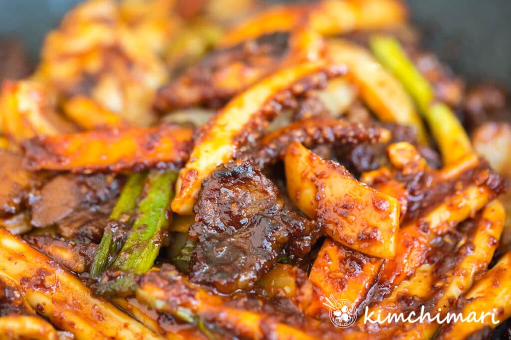 osam bulgogi spicy squid and pork stir fry all cooked in pan looking spicy and glistening