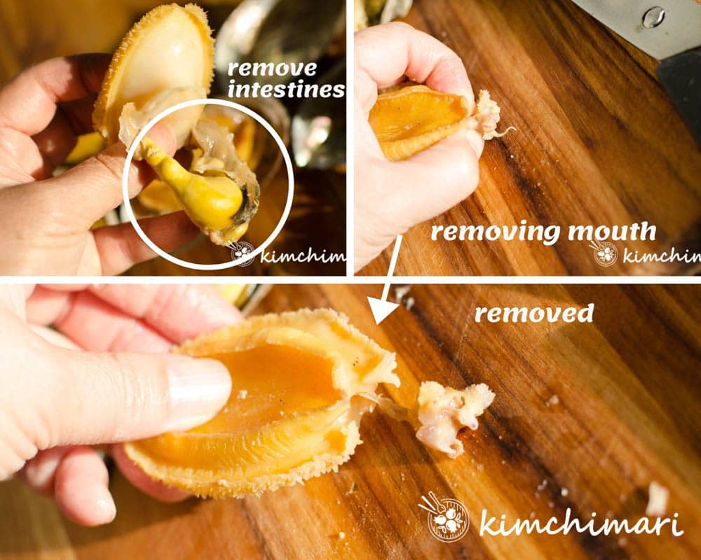 removing mouth and intestines from cooked ablones