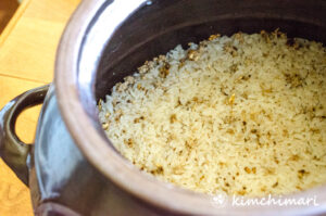nuruk and rice mixture in clay jar at day 1