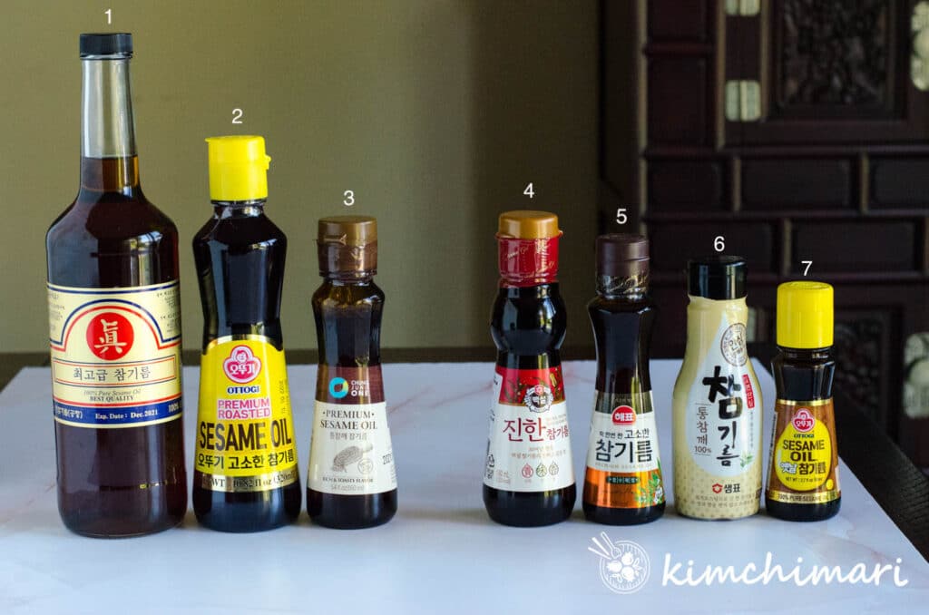 7 different bottles of korean sesame oil lined up