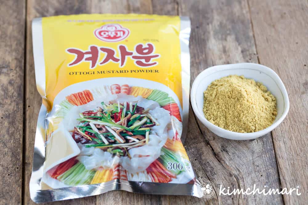 Korean ottogi mustard powder packet and powder in small bowl