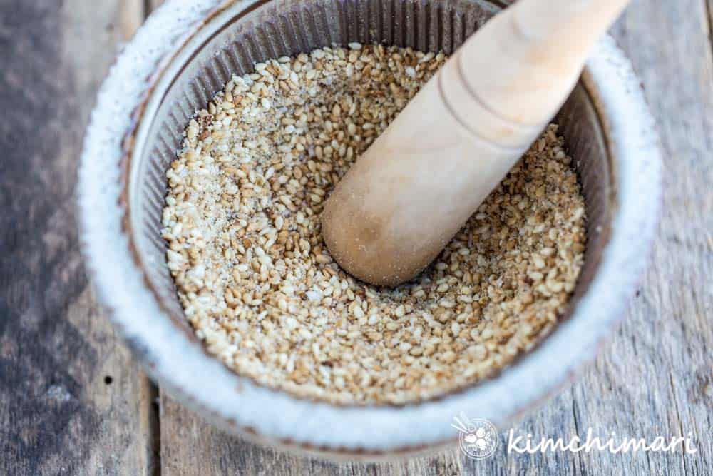 ground sesame seeds in a mortar and pestle