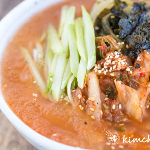 close up view of the icy slushy soup of kimchimari guksu