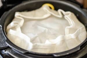 rice cake in pot covered with parchment paper