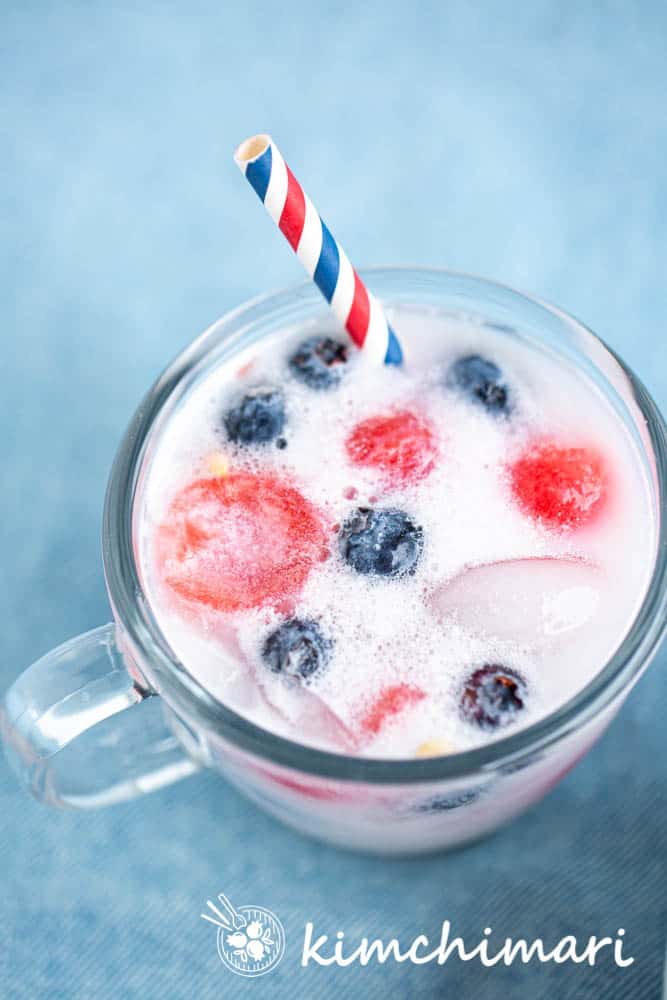 watermelon punch in cup with red white blue straw