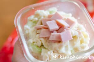 cut ham on top of potato salad