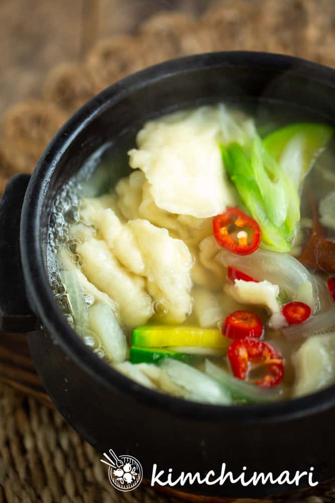 sujebi korean hand torn or pulled nooled soup in ttukbaegi hot pot