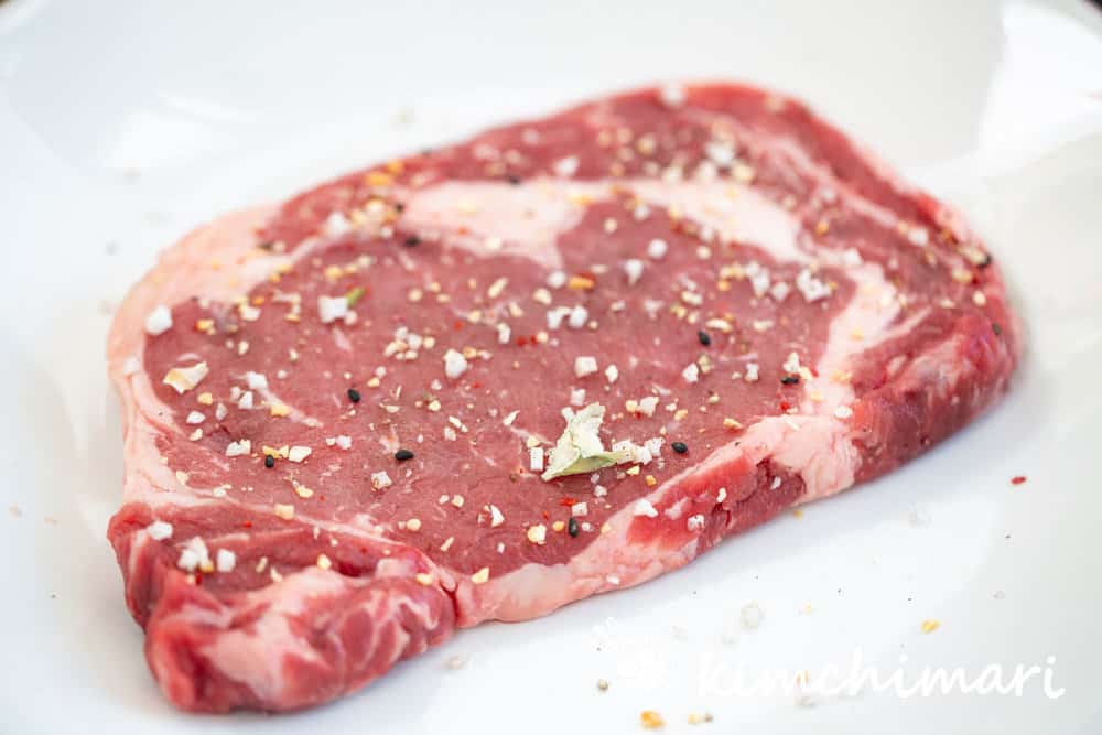 raw steak seasoned with kimchimari seoul bbq salt blend