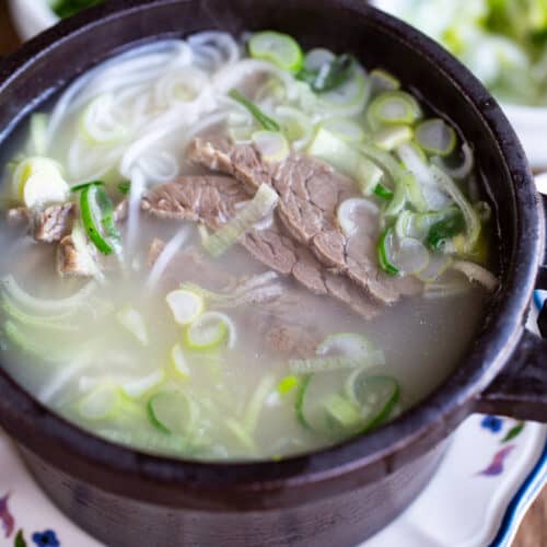 korean beef bone broth soup in ttukbaegi stone pot