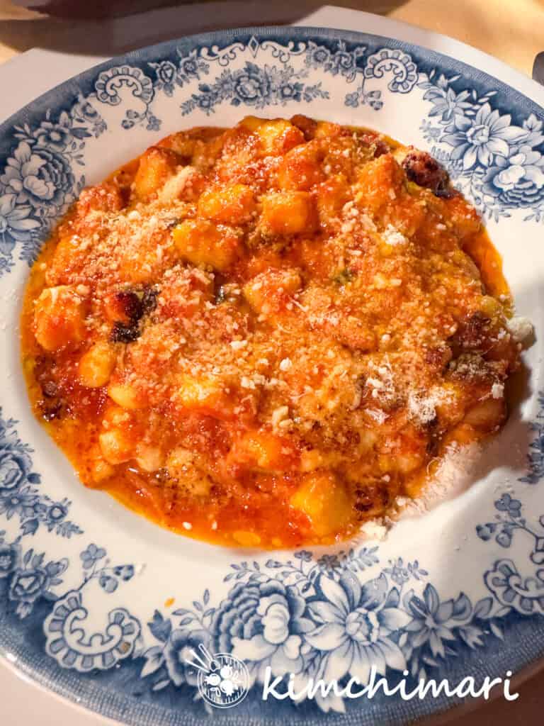 gnocchi alla sorrentina on blue and white plate